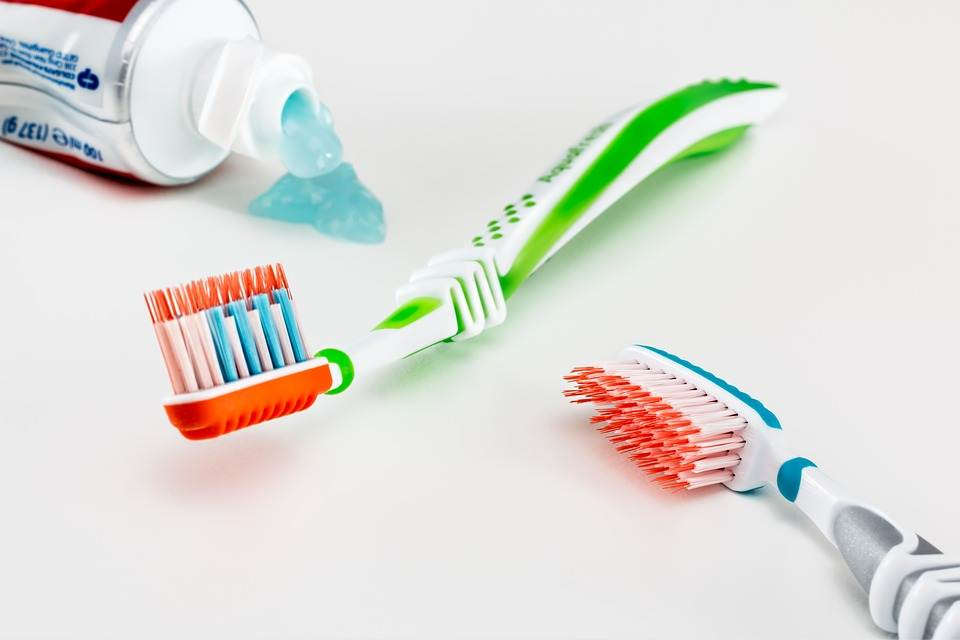 toothpaste and tooth brushes