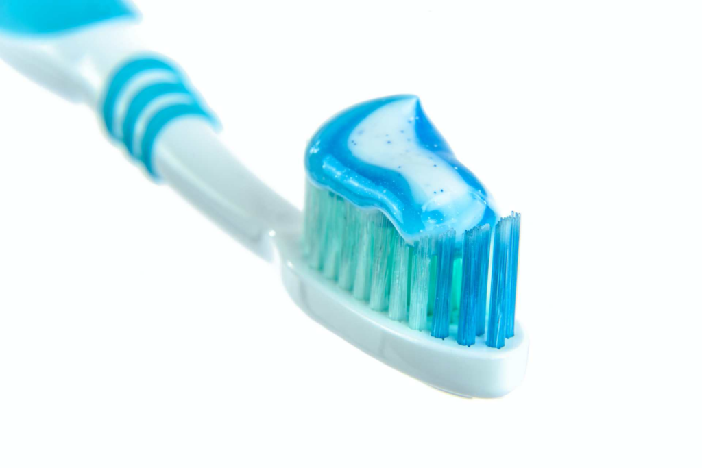 blue toothpaste on toothbrush